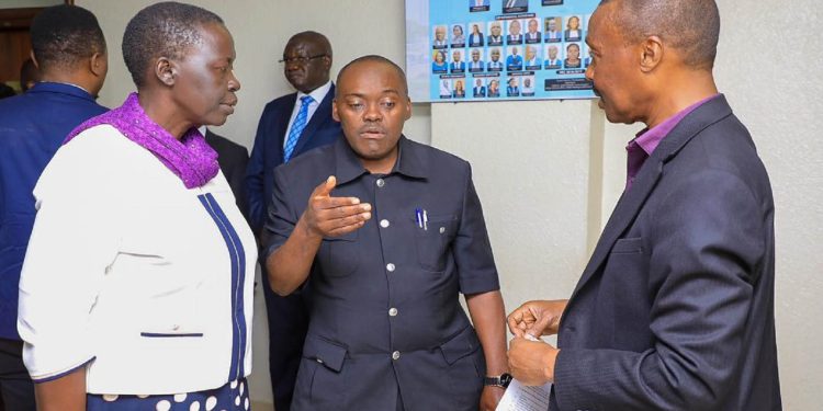 (L-R) ANT's Alice Alaso, NUP's Medard Ssegona and ANT's boss Maj Gen Mugisha Muntu have a a chat.
