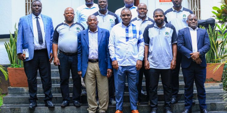 Lukwago with the former KCC footballers: COURTESY PHOTO