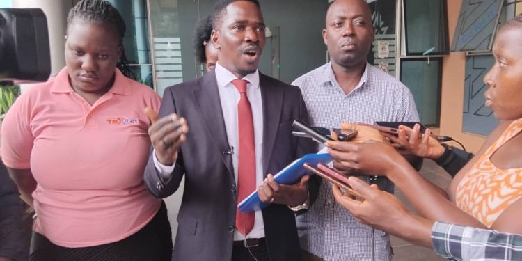 Council Titus Asiimwe together with Namale Desire( a Daughter of Deceased) , and her brother in law, Muyingo Charles at the High Court In Kampala