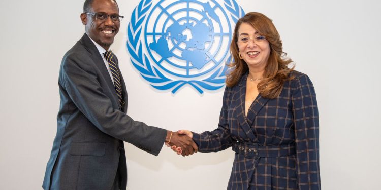 Attorney General of Uganda Kiryowa Kiwanuka with  Ghada Fathi Waly Executive Director United Nations during the Conference in Vienna : Courtesy Photo