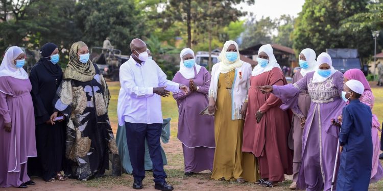 President Museveni greeting Muslim women