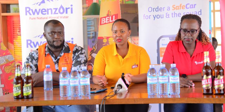 (L-R) Calvin Mukooli- Safe Boda representative, Lillian Kansiime the Bell Lager Brand Manager and Fiona Kemigisha from Coca Cola Beverages during the unveil of the 2024 Bell Obafest Sustainability partnerships