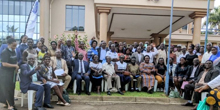 Delegates posing for a memorable group picture shortly after close of the meeting