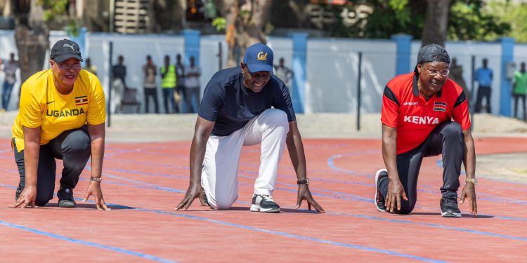 (L-R) Ugandan Speaker of Parliament Anitah Among, President of Kenya Willian Ruto and another official on set for a a sprint in Mombasa-Kenya.