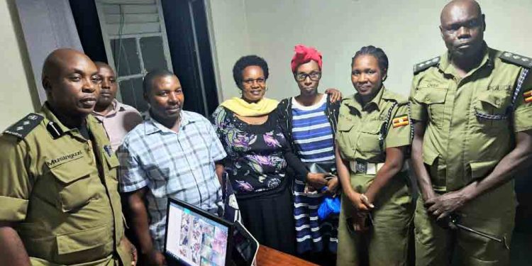 Natukunda (Third right) with police officials.