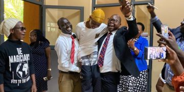 Ugandan young rapper shines brightly as he successfully qualifies for secondary education.