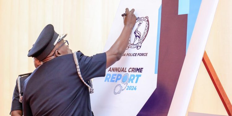 Police Chief Abas Byakagaba launching the report.