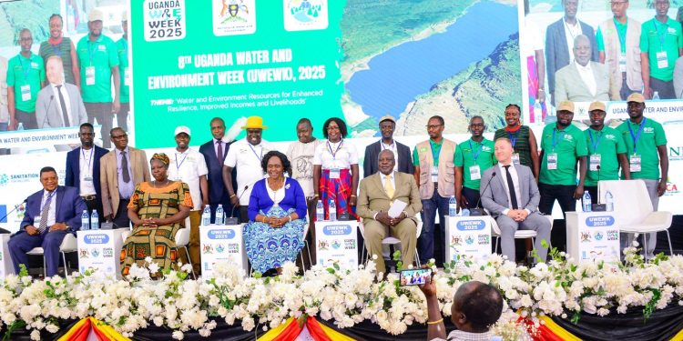 The State Minister for Water and Environment Beatrice Anywar (centre) in a group photo after the launch of the project.