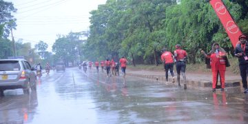 Thousands defy rain to support girl child education; Adams Ategeka finished first in men while Evas Nasasira tops women category
