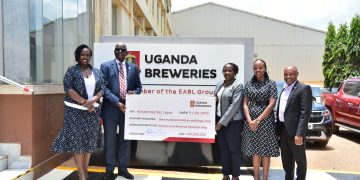Uganda Breweries contributes UGX 100M towards 100th Rotary District 9213 Conference