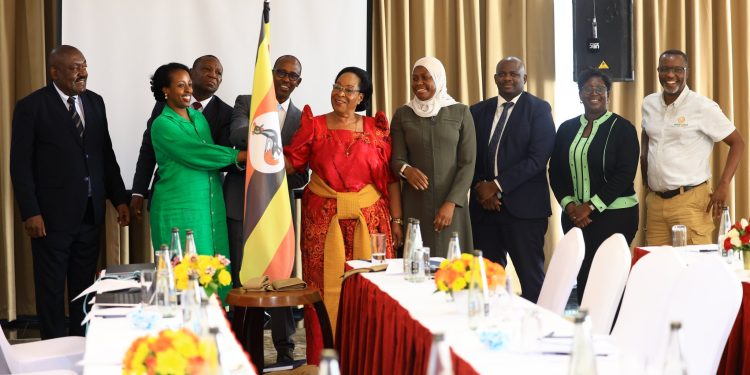 State Minister for ICT Joyce Nabbosa Ssebugwawo (red) commissioning the NSCC.