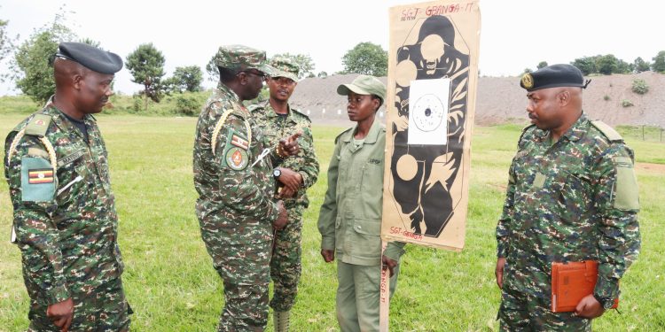 Brig-Gen-Keita-inspects-the-target-shots-from-Sgt-Gbanga-allied-students-from-Central-African-Republic.