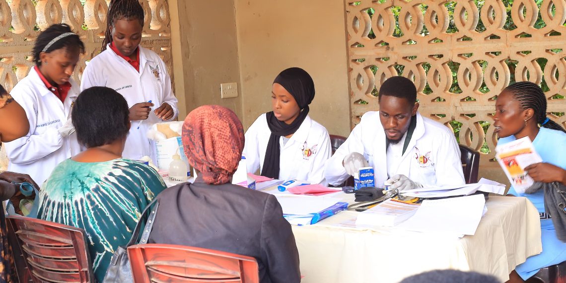 Kampala institute for science and technology  [KIST] medics working on  patients