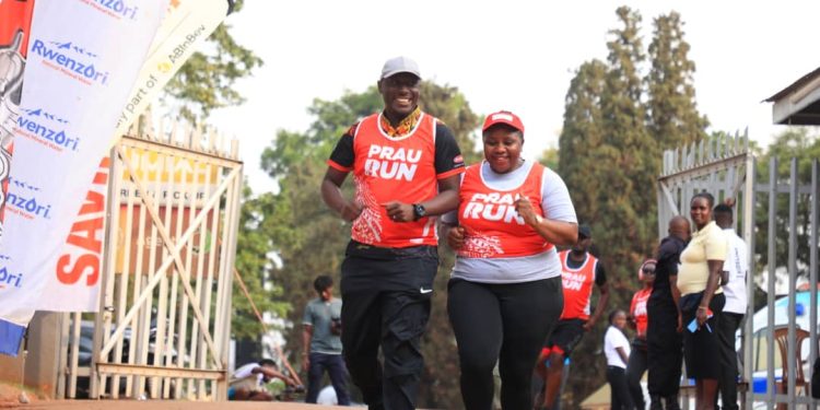 President of the Public Relations Association of Uganda (PRAU), Irene Nakasiita, and Collins Semanda