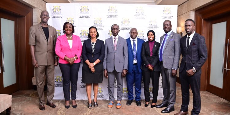 Left to Right : Mr. Wilbrod Owor Exec Dir. UBA, Ms. Birungi Christine Dir. at UIBFS , Dr. Kansiime Mary Nyende Dir. at UIBFS, Mr. John Chemonges Exec Dir. BOU, Mr. Shaffi Nambobi CEO UGAFODE, Ms. Naila Kobusinge Director Corporate and Legal Services PKF, Mr. George Ochom General Manager - DFCU, Mr. Kusiima Razak Corporate Services Associate