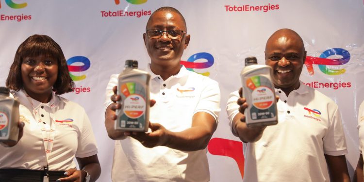 Allan Omuron (Centre), Specialties Manager at TotalEnergies Marketing Uganda, Majorine Nankinga(L) Lubricants sales engineer and Mr. Joseph Wechuli(R), the Finance Manager of TotalEnergies Marketing Uganda pose for a photo during the launch of the “Kyuusa Gear ne Hi-Perf” campaign in Kampala.