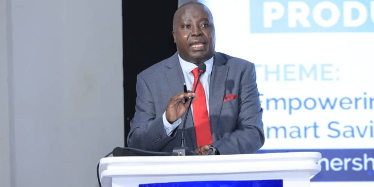 Japheth Aritho, Managing Director of Airtel Mobile Commerce Uganda Limited, gives his address.
