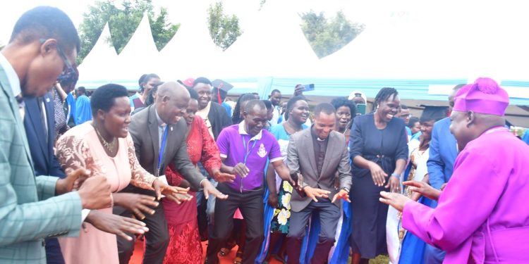 Bishop Paul Kiptoo Masaba, other Church leaders and Compassion International staff in jubilation at the function