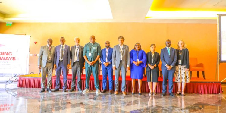 A group of NGO dignatries from NGOs, World Bank and Ministry of Finance Uganda at the opening of the conference
