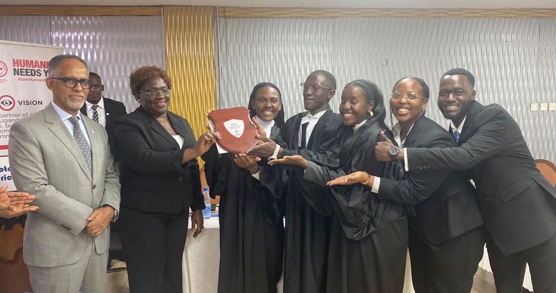 Uganda Christian University team while receiving award from Justice Susan Okalany and the organisers,ICRC