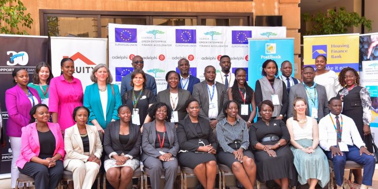 The Housing Finance Bank team poses for a group photo with partners from the European Union and other partner banks after the successful launch of a partnership to support sustainable enterprises across Uganda