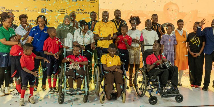 MTN-Uganda-Chief-Marketing-Officer-Sylvia-El-Sheikh-wearing-a-veil-joins-past-beneficiaries-and-MTN-staff-during-the-launch-of-MTN-Changemakers-Phase-III-in-Kampala-on-October-28-scaled.