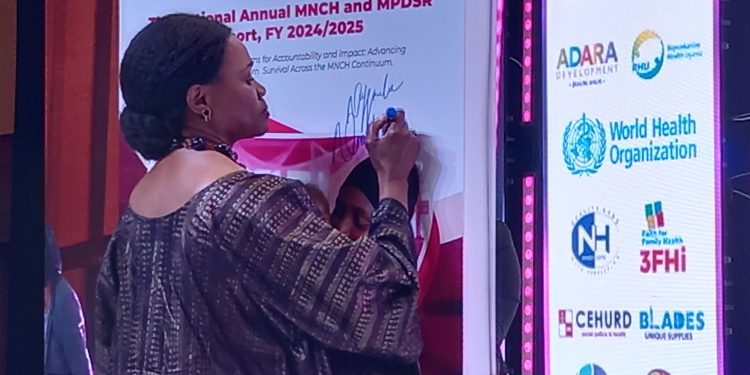 Her Royal Highness Sylvia Nagginda Luswata, while signning on the guudelines