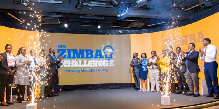 Housing Finance Bank Team, partners and stakeholers pose for a group photo at the launch the HFB Zimba Challenge, an innovative challenge where the participant with the best affordable prototype house will be rewarded with UGX 100M