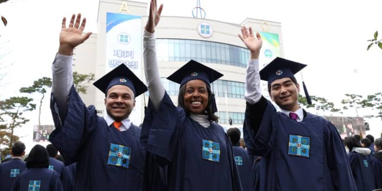Graduates celebrate and take commemorative photos at the Zion Christian Mission Center 116th Graduation Ceremony held at the Shincheonji Church of Jesus, Temple of the Tabernacle of the Testimony, Cheongju Church, on November 2.