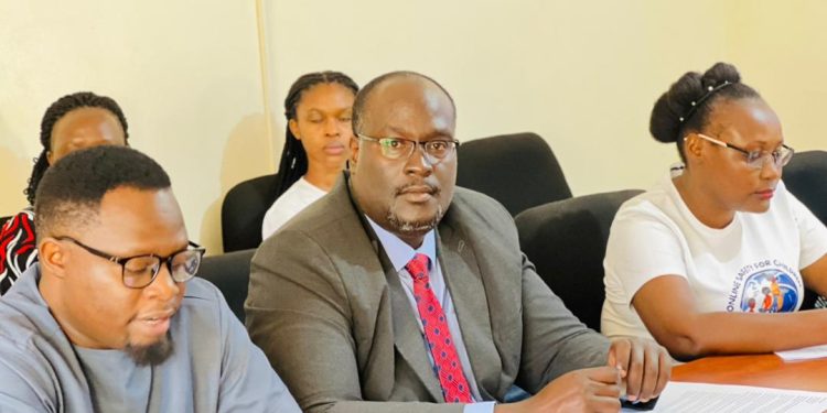 (L-R)Mr. Timothy Opobo, Executive Director at AfriChild Centre, Damon Wamara, Executive Director UgandaCRNN, Hadijah Mwanje, Executive Director High Sound for Children.