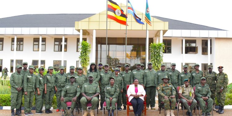 Prime-Minister-Rt-Hon-Robinah-Nabbanja-poses-for-a-photo-with-a-section-of-the-first-cohort-of-UDB-staff