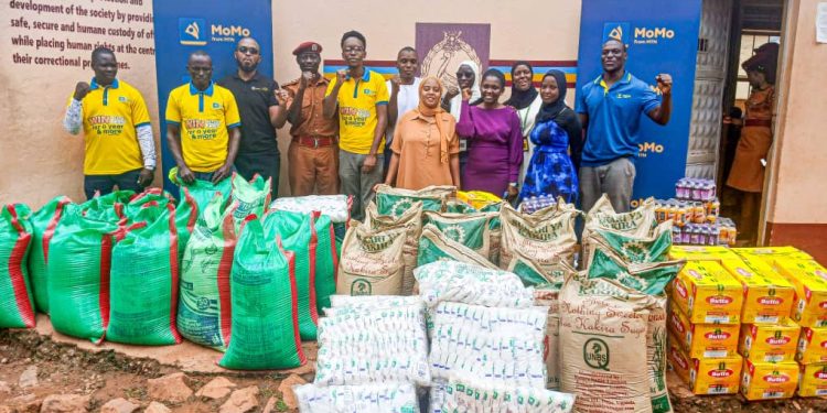 Officials from MTN MoMo and the Uganda Prisons Service during the Ramadhan outreach at Luzira Prison where food hampers were donated to support inmates observing the Holy Month