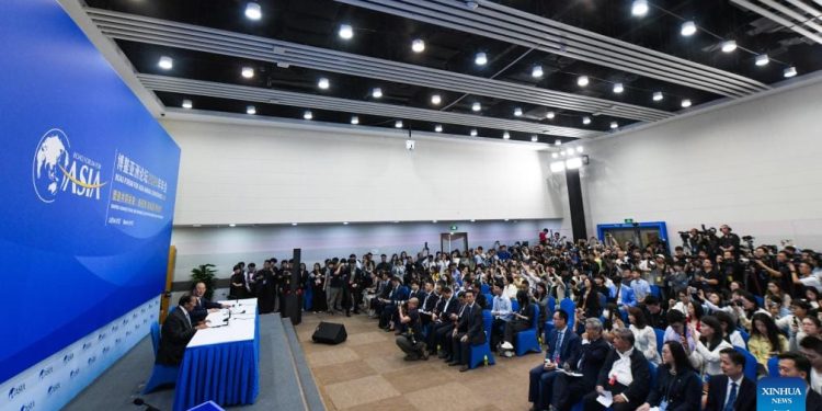 A photo taken on March 24, 2026 captures a press conference for the Boao Forum for Asia Annual Conference 2026, where its flagship reports were released in Boao, Hainan Province, China.