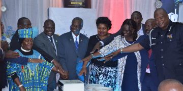 Dr John Ekure Challenges Ugandans to Aim Higher at Inspiring Book Launch in Kampala