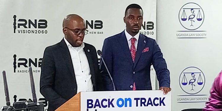 L-R, Andrew Karamagi and Anthony Asiimwe
