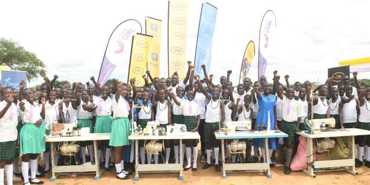 Pupils in Kotido District celebrates receiveing sewing machines on April.28