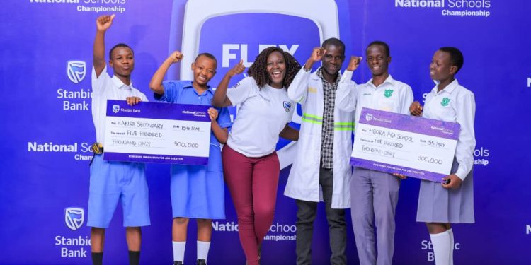 Some of the regional finalists from Eastern Uganda post for a group photo during the last day of Stanbic National Schools Championship bootcamp session at Gayaza High School, Wakiso District