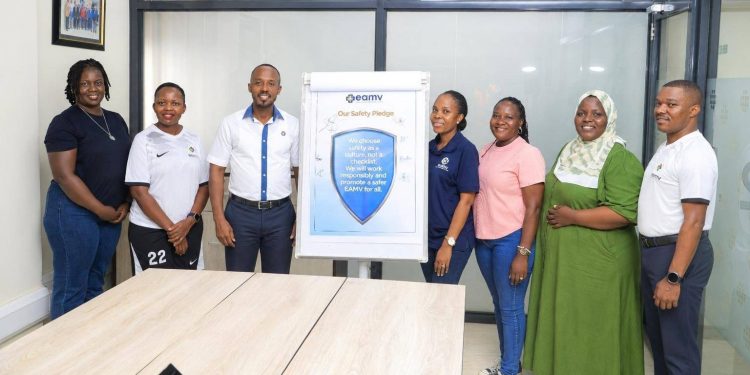 MGT TEAM - The management team, led by the Managing Director, Mr Brian Kavuya (3rd left) pose for a photo at their factory premises in Namanve after signing the safety pledge.
