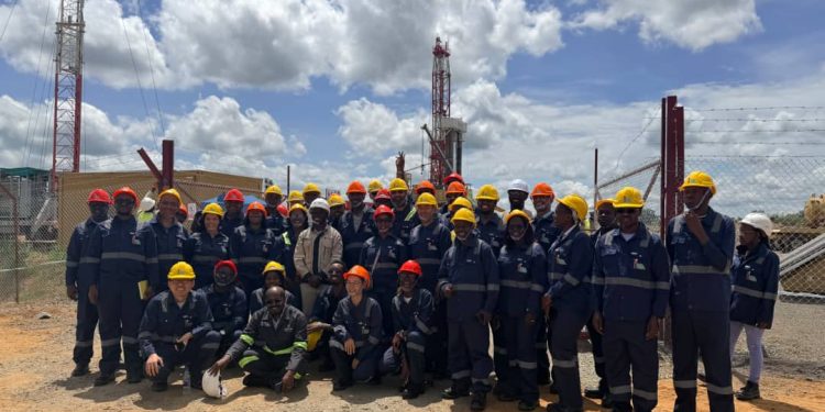 A group of Delegates from this year's oil and Gas convention during a visit to the Tilenga Oil well.