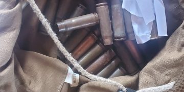 Uganda Police nab security guard with military items