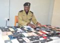 Police recover 143 suspected stolen smart phones, three arrested in Cross-Border trafficking crackdown