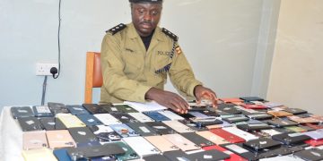 Police recover 143 suspected stolen smart phones, three arrested in Cross-Border trafficking crackdown