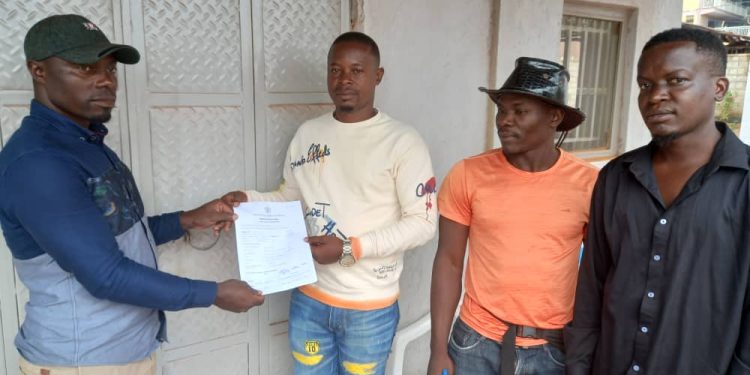 Kaweesa George William receiving his nomination papers