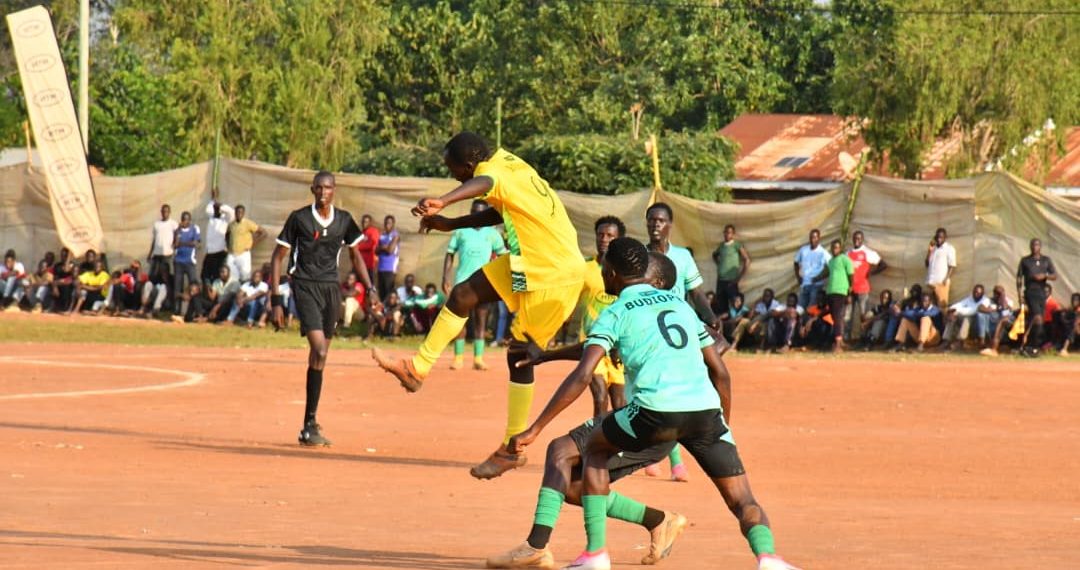 A-Bukono-player-rises-to-challenge-for-a-header-as-Budiope-defenders-close-in-during-a-competitive-encounter-that-finished-goalless