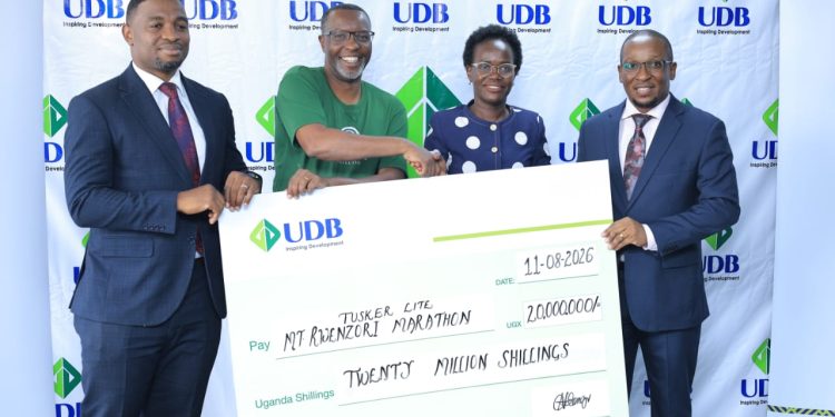 L-R Collins Masiga, Amos Wekesa, Dr. Patricia Ojangole and Joshua Allan Mwesiga during the press event to announce the sponsorship.