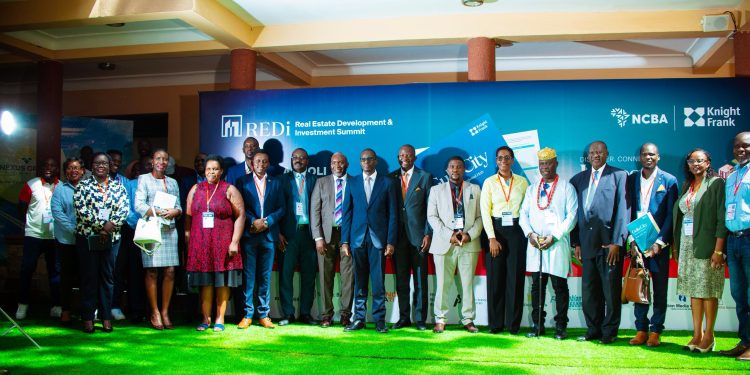Partners pose for a group photo at the Real Estate and Infrastructure Conference