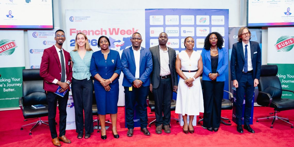 Mercy Iselu (Second from right), Sector Head for Food and Agriculture at dfcu Bank, poses for a photograph with fellow panelists and moderators following her session at the French Week business forum held at the Uganda Business Facilitation Centre.