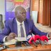 Walimu Cooperative Union Board Chairperson Steven Oringa speaks to journalists in Kampala.