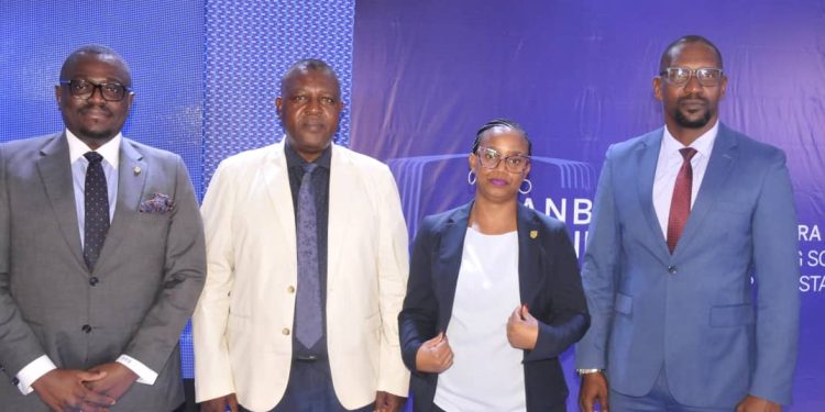 From-left-to-right-Stanbics-Executive-Head-of-Business-and-Commercial-Banking-Tunde-Thorpe-Sam-Kuloba-Stanbics-Melisa-Nyakwera-and-Hassan-Nkuutu-during-the-Business-Forum-in-Mbale-on-Tuesday