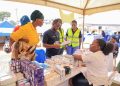 424 Mutungo residents receive free health services as dfcu-Rotary Uganda partnership expands